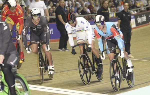Eddie Dawkins (NZL), Chris Hoy (Team Sky) and Jason Niblett (Jayco AIS) strain to get the best postion behind the derny in the men's keirin.