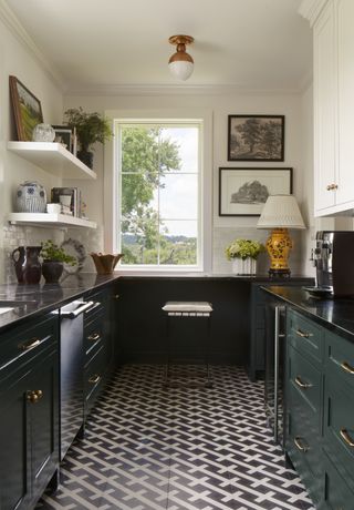 A kitchen with patterned flooring