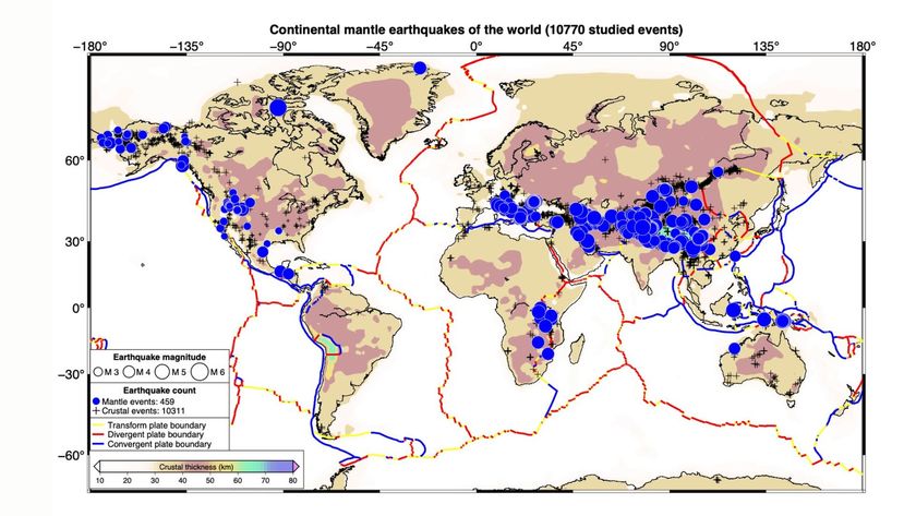 A map of the world with dark blue dots showing earthquake activity and traces in red of the various tectonic plates around planet Earth