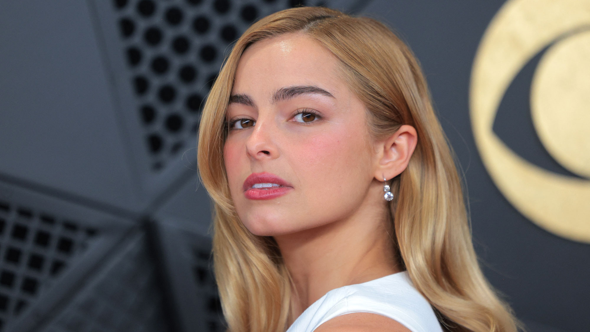 Addison Rae wears a white bra