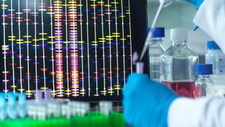 Scientist testing DNA in a lab