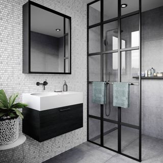 bathroom with grey tiled flooring