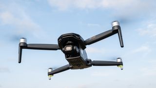 Bwine F7GIM in flight against a blue sky