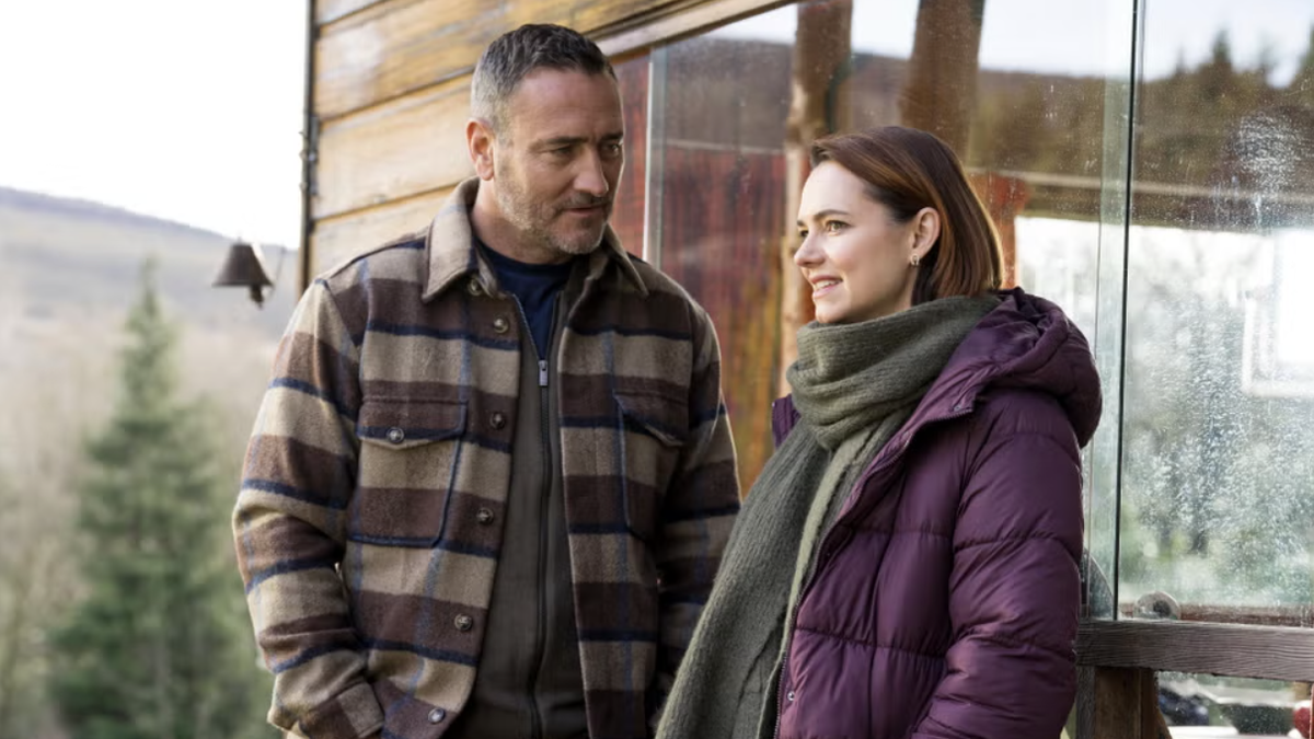 Dressed in winter clothes, Jimmy (Will Mellor) and Dani (Kara Tointon) talk to each other in The Teacher season 2