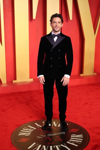 Jonathan Bailey on the red carpet at the Vanity Fair 2024 Oscar Party
