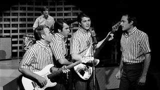 The Beach Boys (l-r) Al Jardine, Dennis Wilson (drummer), Carl Wilson, Brian WIlson, Mike Love appearing on Bob Hope Presents The Chrysler Theater in 1964