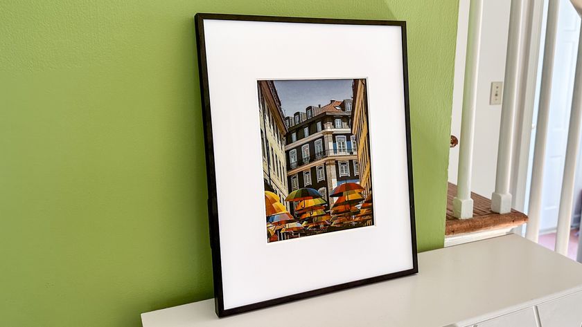 Aluratek ePaper 13.3 inch Wifi Digital Photo Frame on a shelf