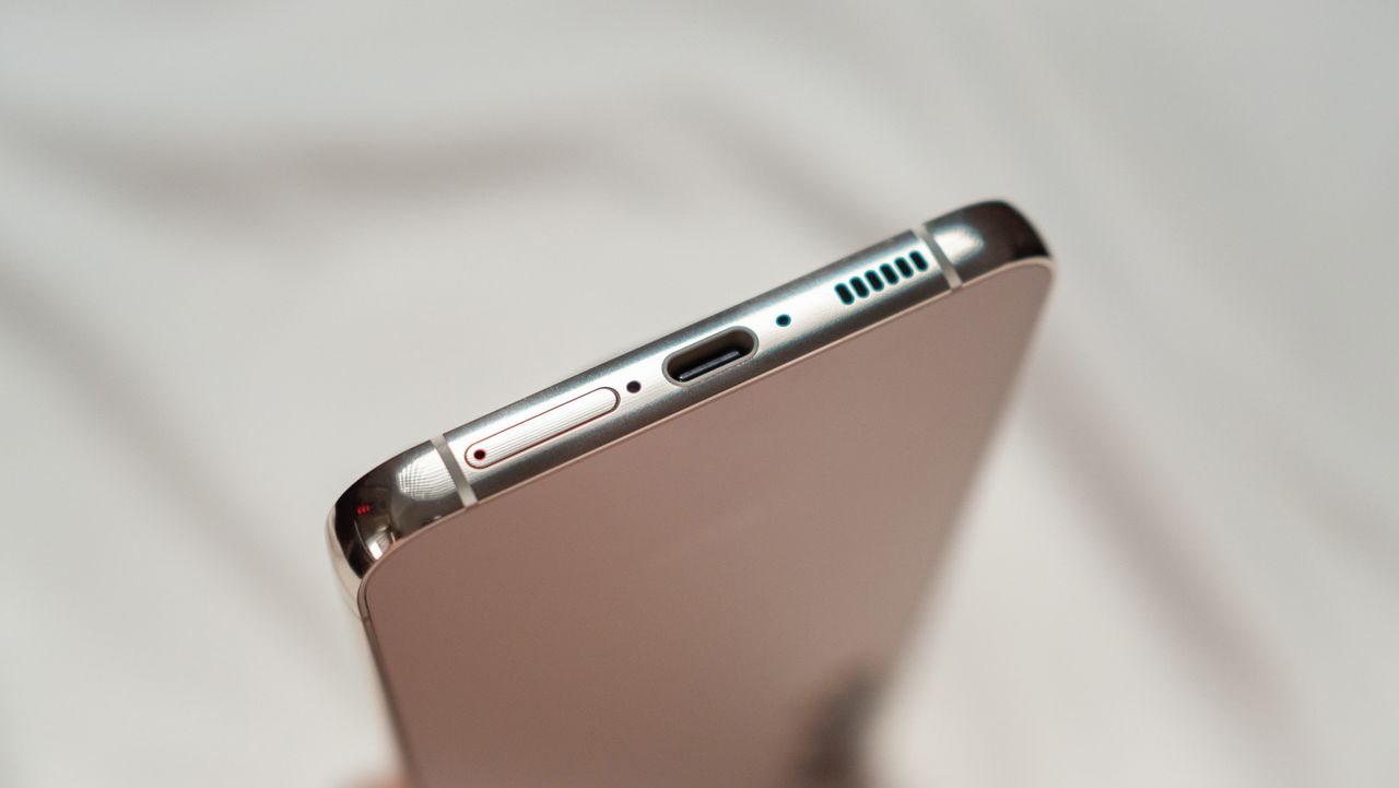 Bottom portion of Samsung Galaxy S23 Plus with USB-C charging port and SIM card tray