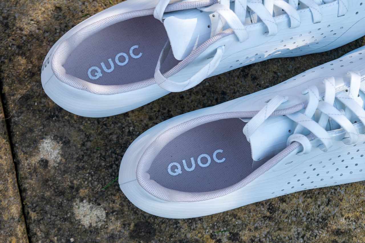 A pair of white Quoc M Pro Lace shoes