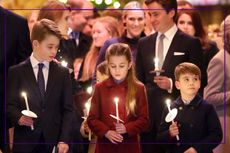 Prince George of Wales (L), Britain's Princess Charlotte of Wales (C) and Britain's Prince Louis of Wales (R) attend the "Together At Christmas" Carol Service" at Westminster Abbey in London on December 8, 2023