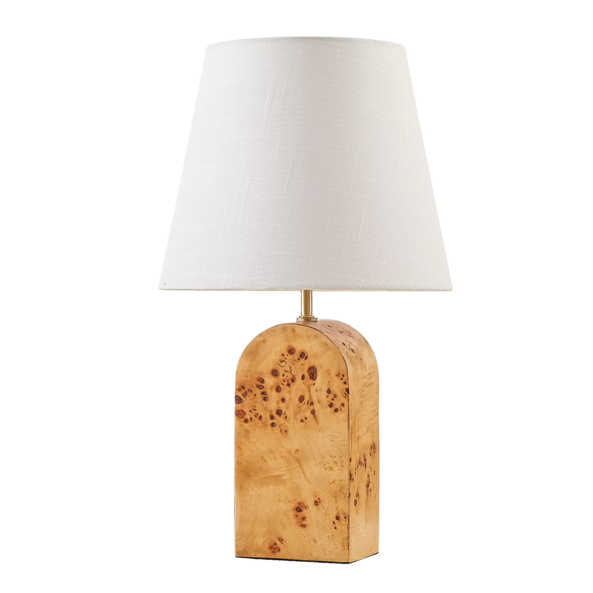 a burl wood lamp with a white shade