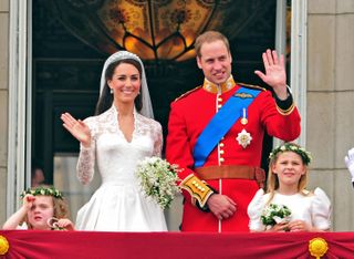 Prince William, Duke of Cambridge and Catherine, Duchess of Cambridge greet crowd of admirers from the balcony of Buckingham Palace on April 29, 2011 in London, England