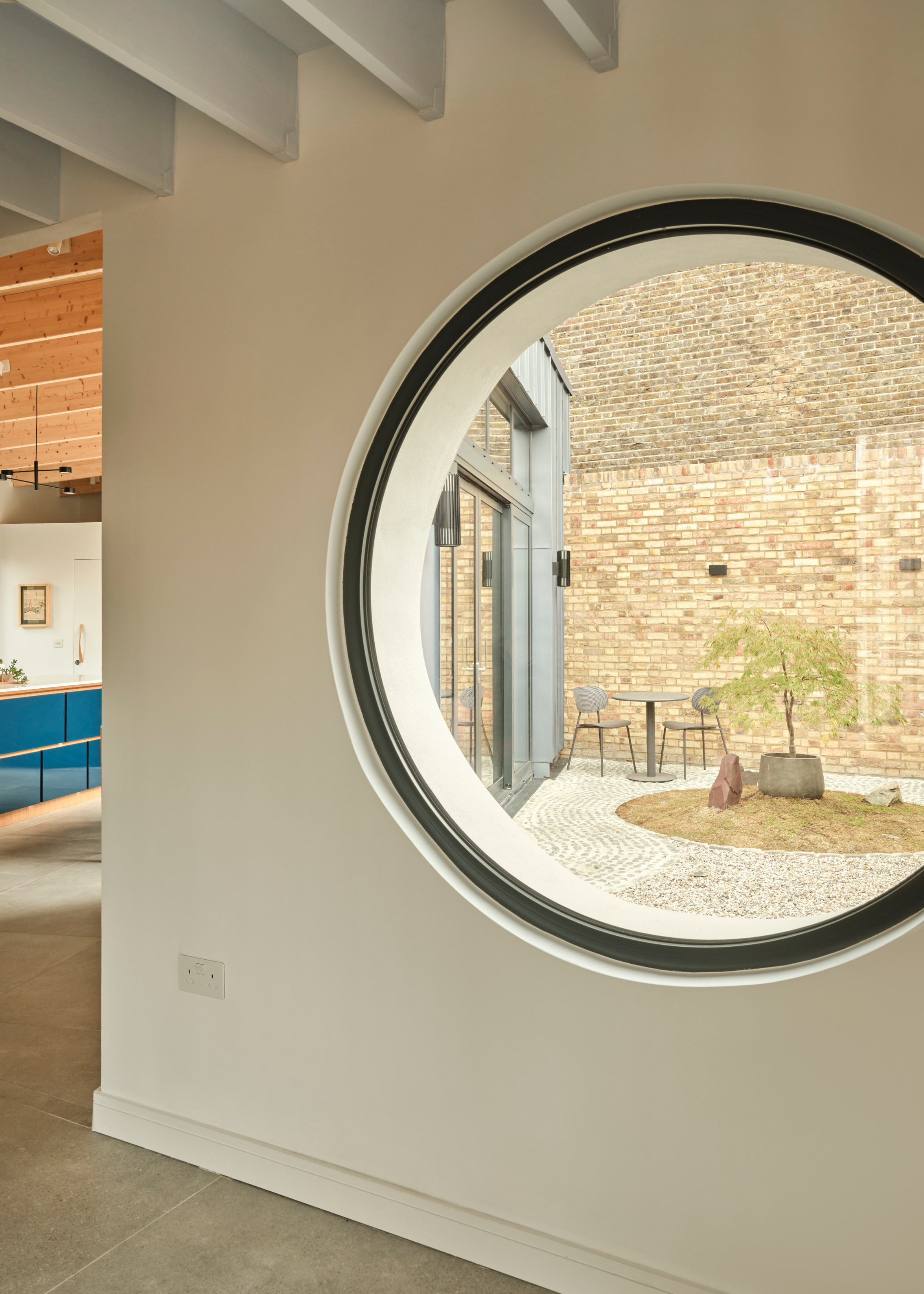 The circular window looks out into the central courtyard