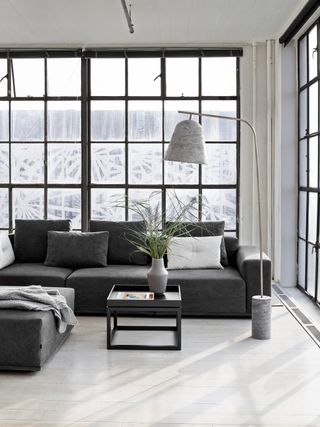 A modern living room idea with low-slung furniture by Houseology