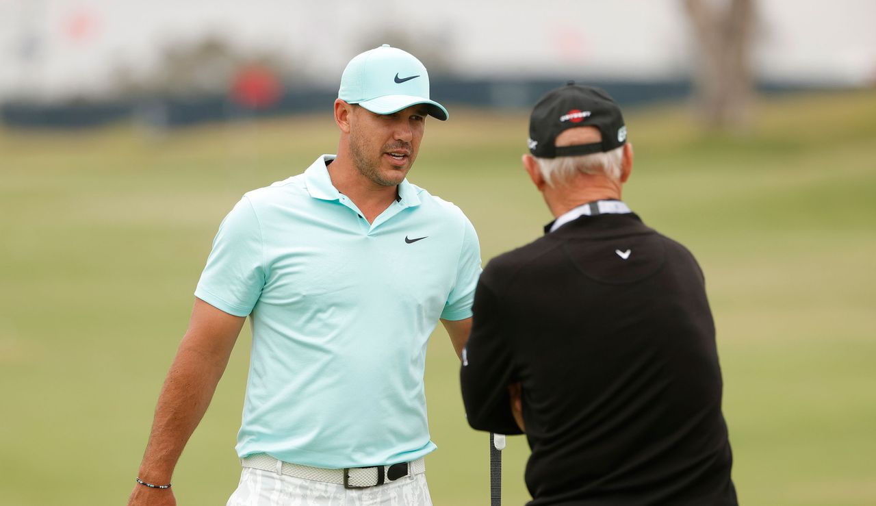 Brooks Koepka chats to Pete Cowen