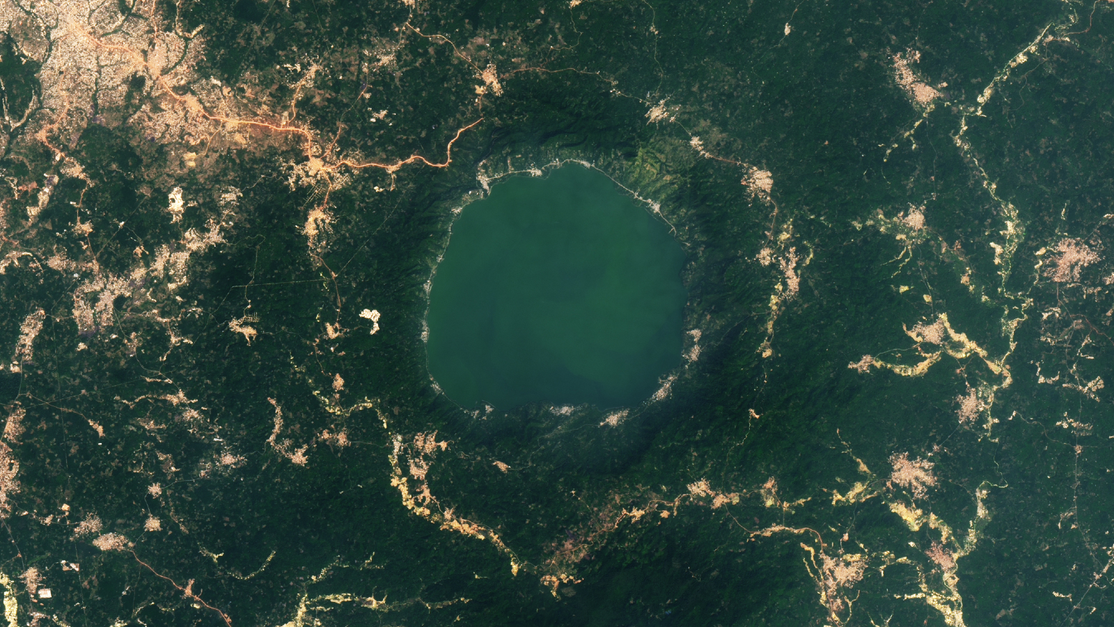 A 2024 satellite photo showing the lake surrounded by even more gold