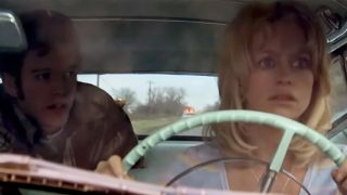 Goldie Hawn looking worried while driving a car in The Sugarland Express