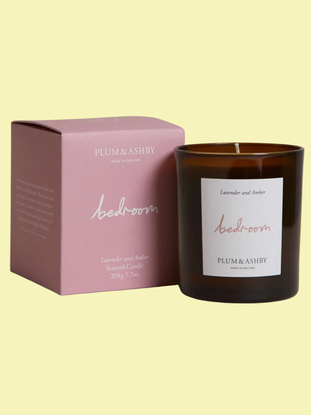 An amber glass scented candle from Plum &amp;amp; Ashby