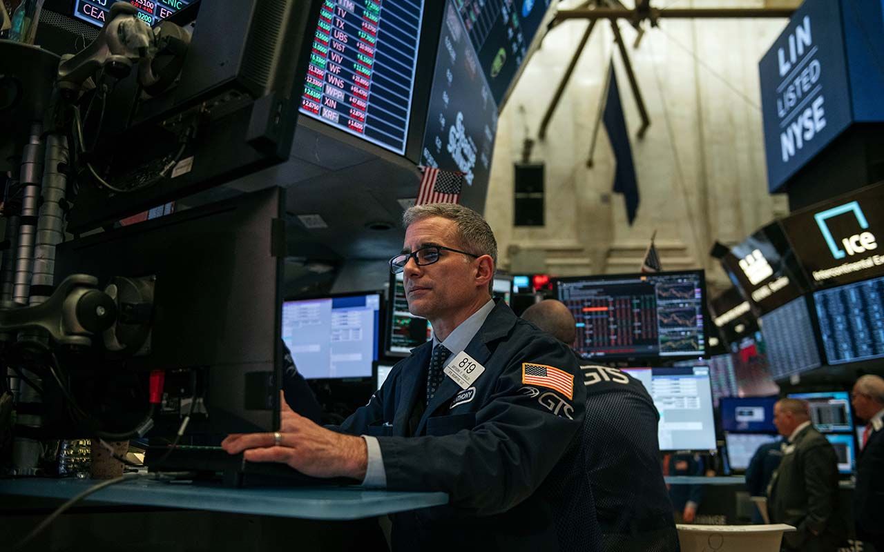 NEW YORK, NY - FEBRUARY 28: Traders work on the floor of the New york Stock Exchange on February 28, 2020 in New York City. Markets continued their downward plunge Friday as continuing fears 