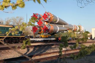 The Russian Soyuz rocket carrying the Bion-M1 space capsule filled with animals moves toward its launch pad at Baikonur Cosmodrome in Kazakhstan.