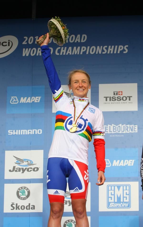 Emma Pooley (Great Britain) celebrates her victory on the podium.