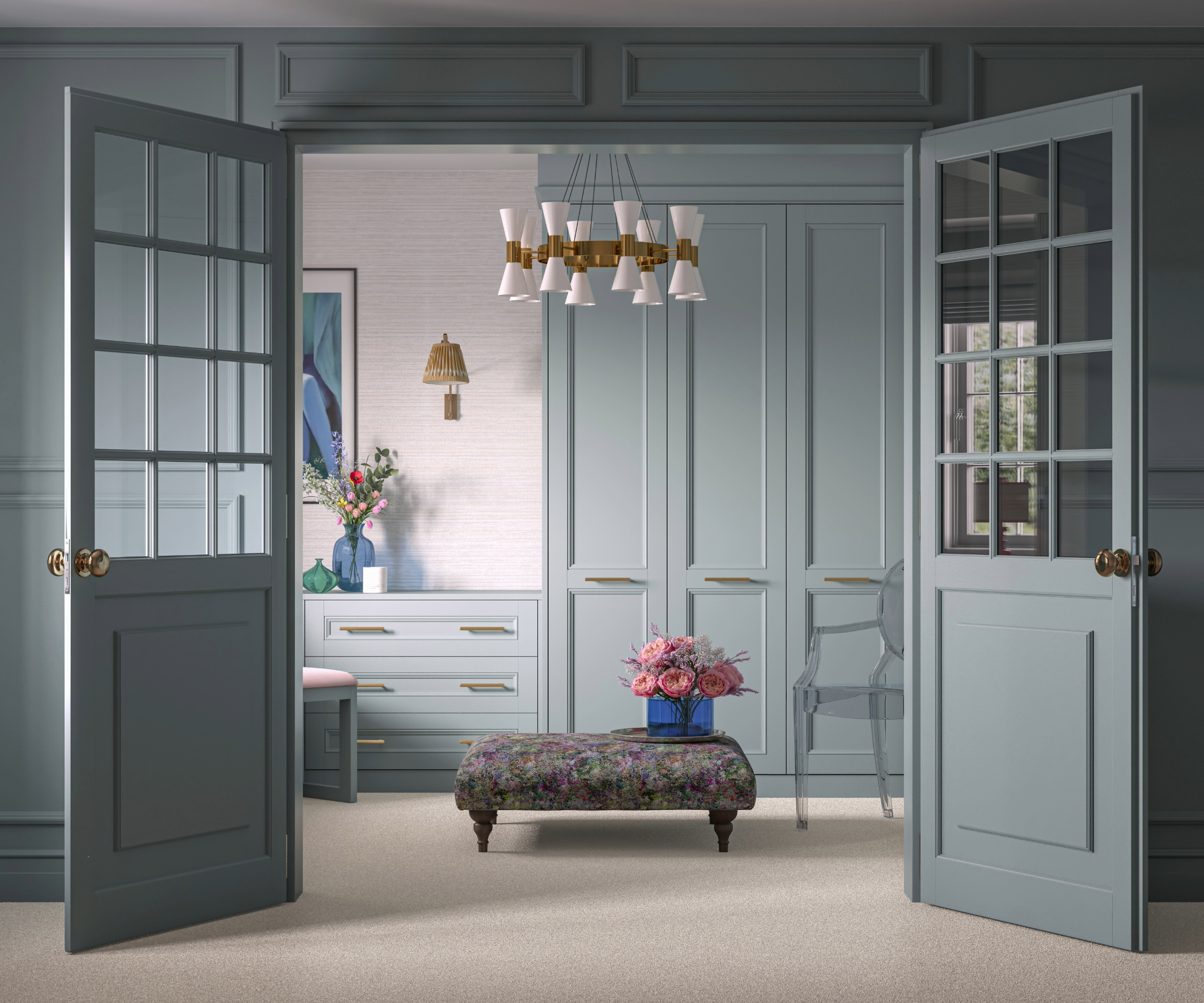 Open double doors reveal a dressing room with a central stool and storm blue wardrobes and drawers