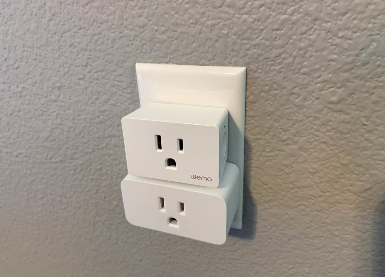 Wemo Wifi Smart Plug plugged in above Hue smart plug