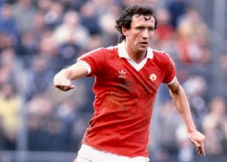 John Gidman in action for Manchester United against Notts County in March 1982.