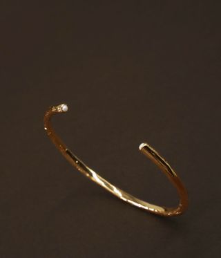 gold bangle with pearl ends