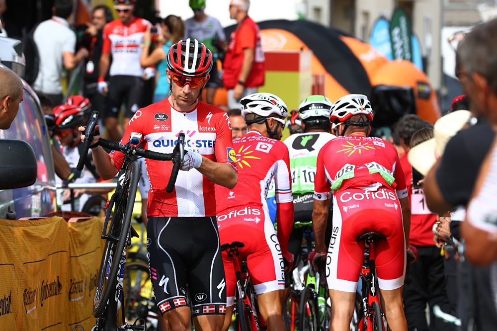Michael Morkov walks to the start of stage 11 at the Vuelta a Espana