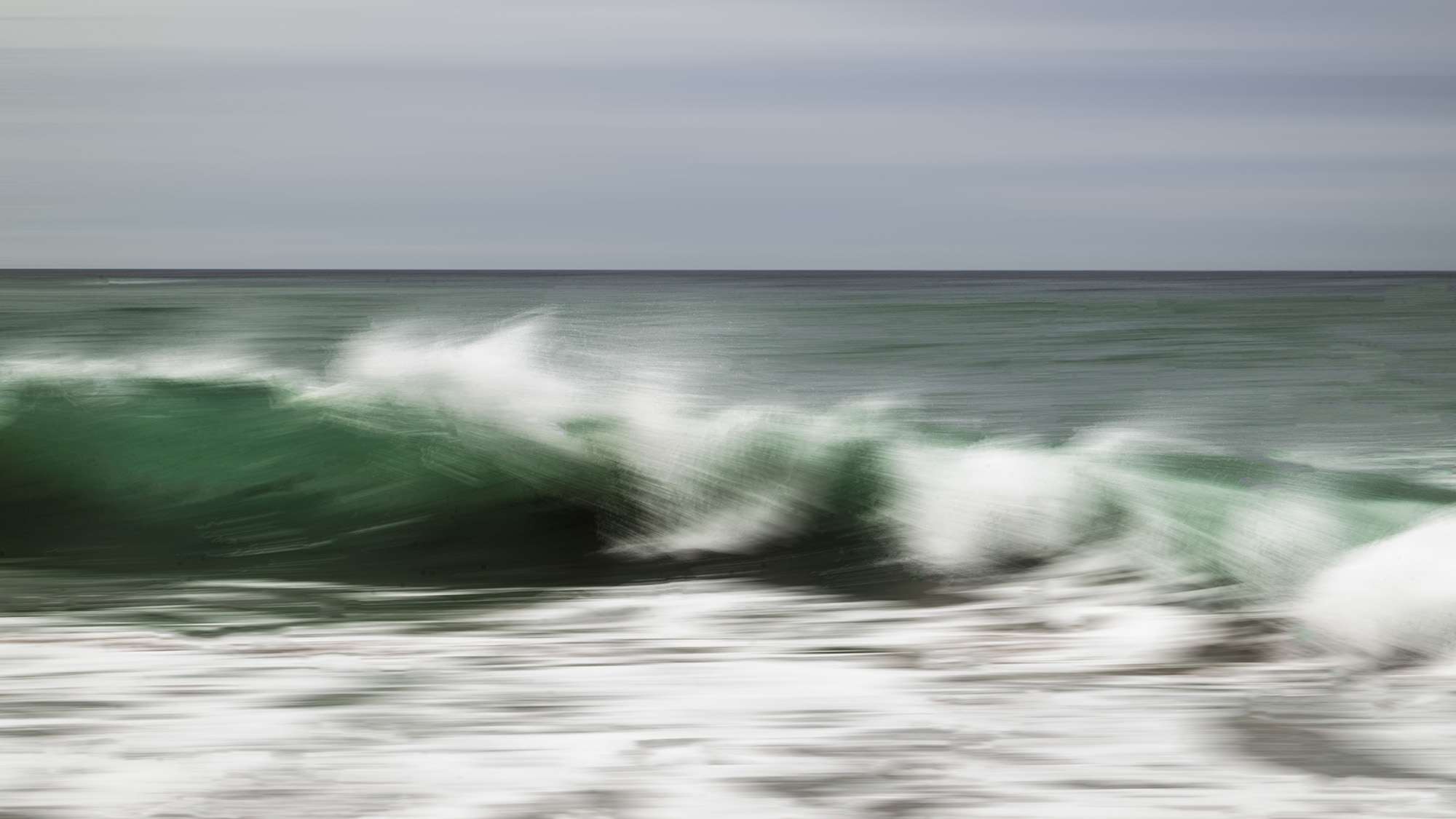 ICM shot of crashing surf