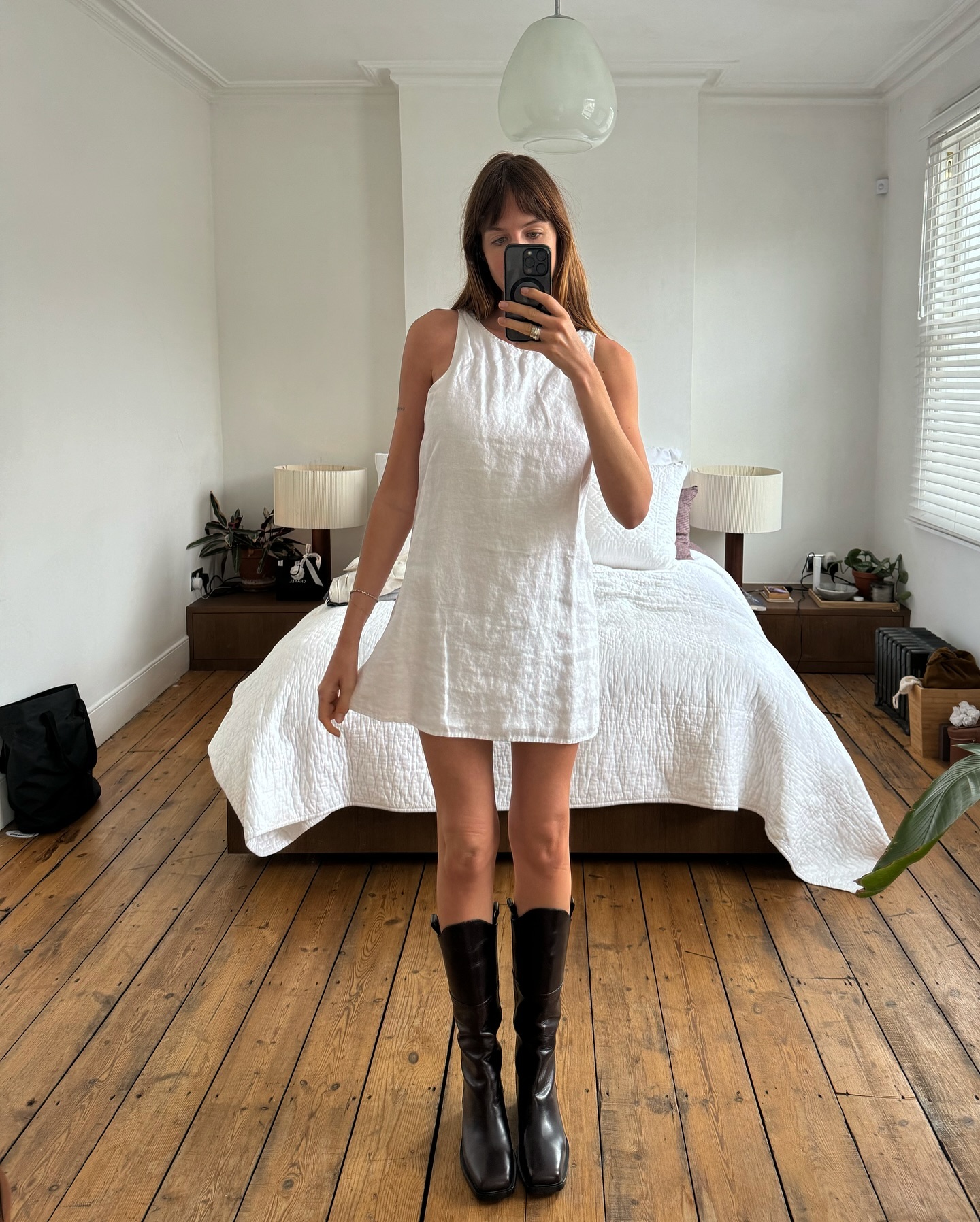 An image of @lizzyhadfield wearing an all-white outfit for women.