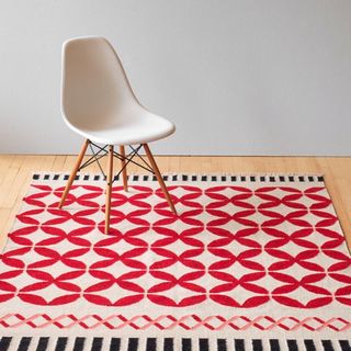 room with unique patterns and textures kilim rug and chair