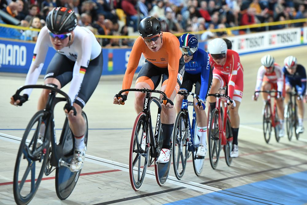 Gold medal winner Netherland's Kirsten Wild (2L) competes in the women's omnium during the UCI Track Cycling World Championships