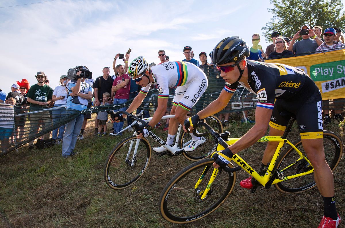 while Wout Van Aert (Crelan-Charles) takes the outside line