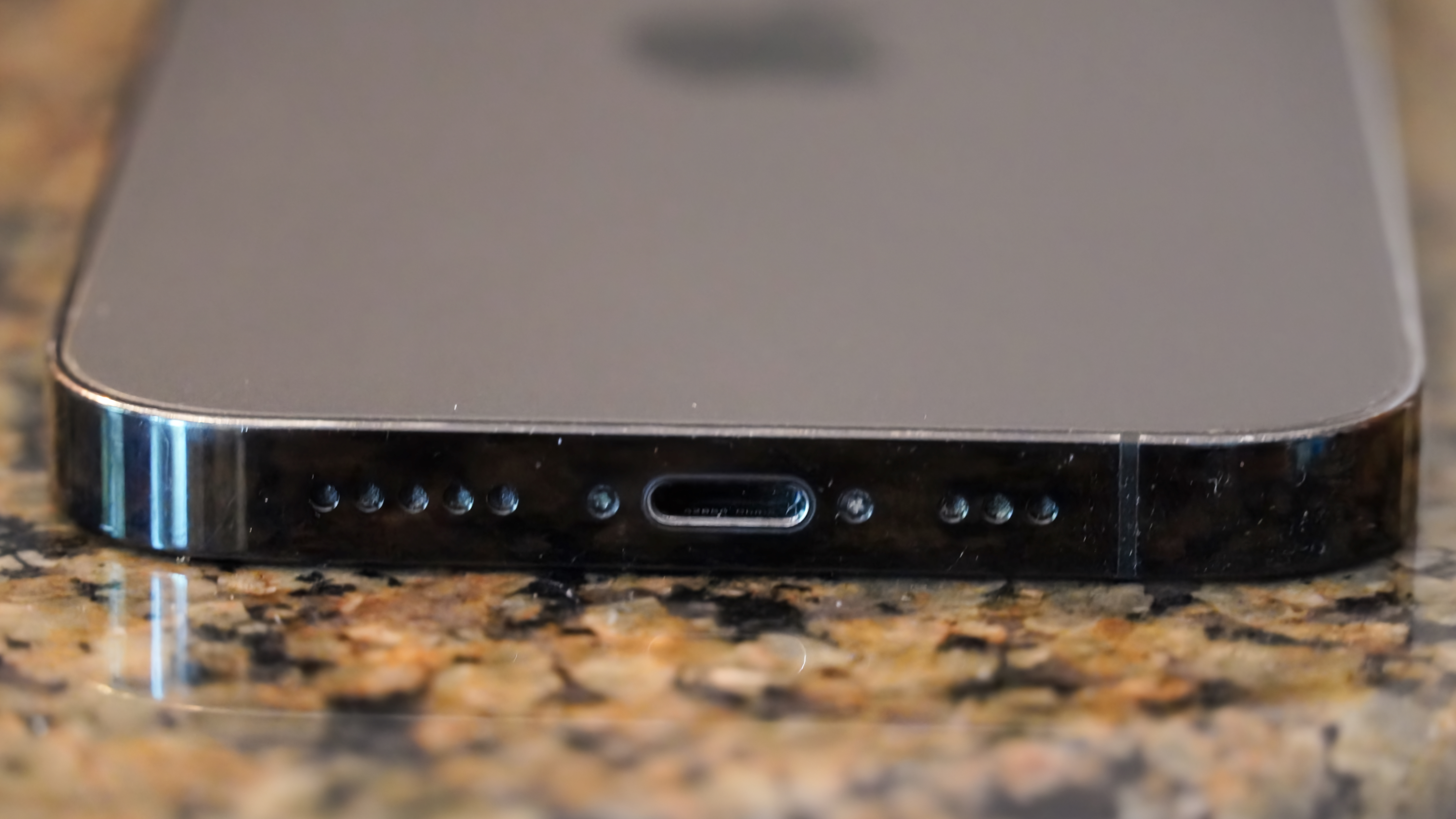 The bottom of my dad's iPhone 14 Pro after using the Otterbox Mobile Device Care Kit.