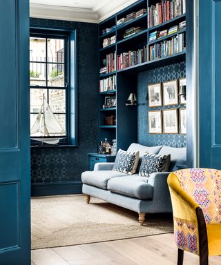 Blue living room with blue painted woodwork