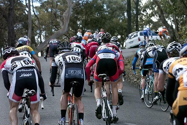 Riders at the back of the field find the going tough on one of the courses many climbs.