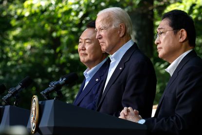 President Joe Biden joined by the leaders of South Korea and Japan. 