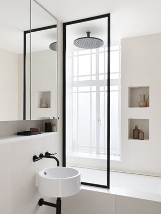 A bathroom with black fixtures
