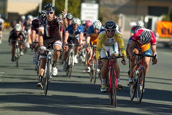 Ben Kersten (left) of the Swan Hill Heart of the Murray team expresses his anguish at stage winner Jonathan Cantwell (V Australia) after some argy-bargy to the finish of stage ten in Euston.