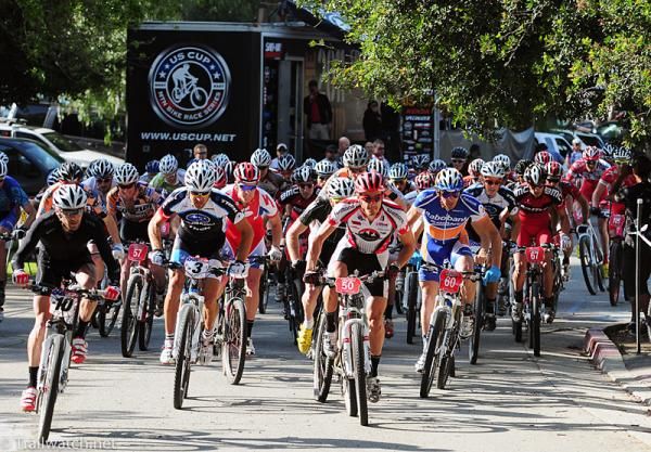 A big field of Elite men take to the course.