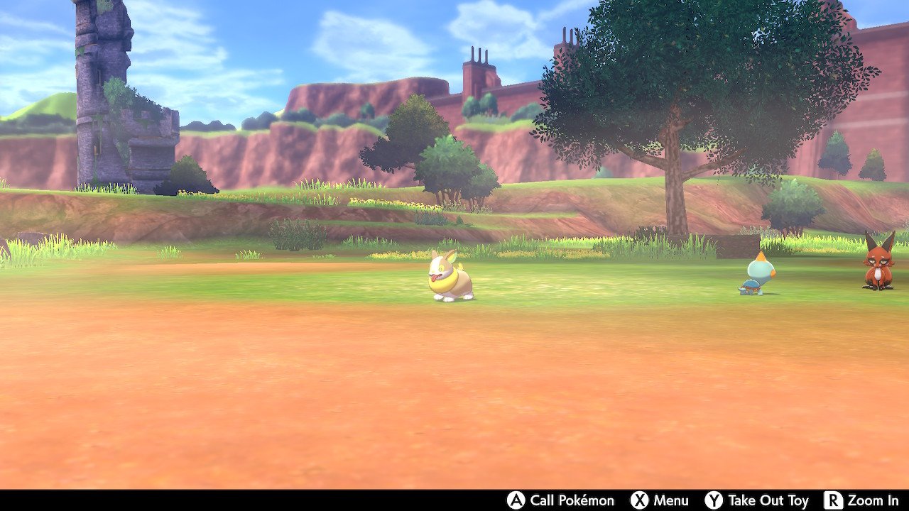 Center the camera on the Pokemon you want to call, then press the A button to call them over.