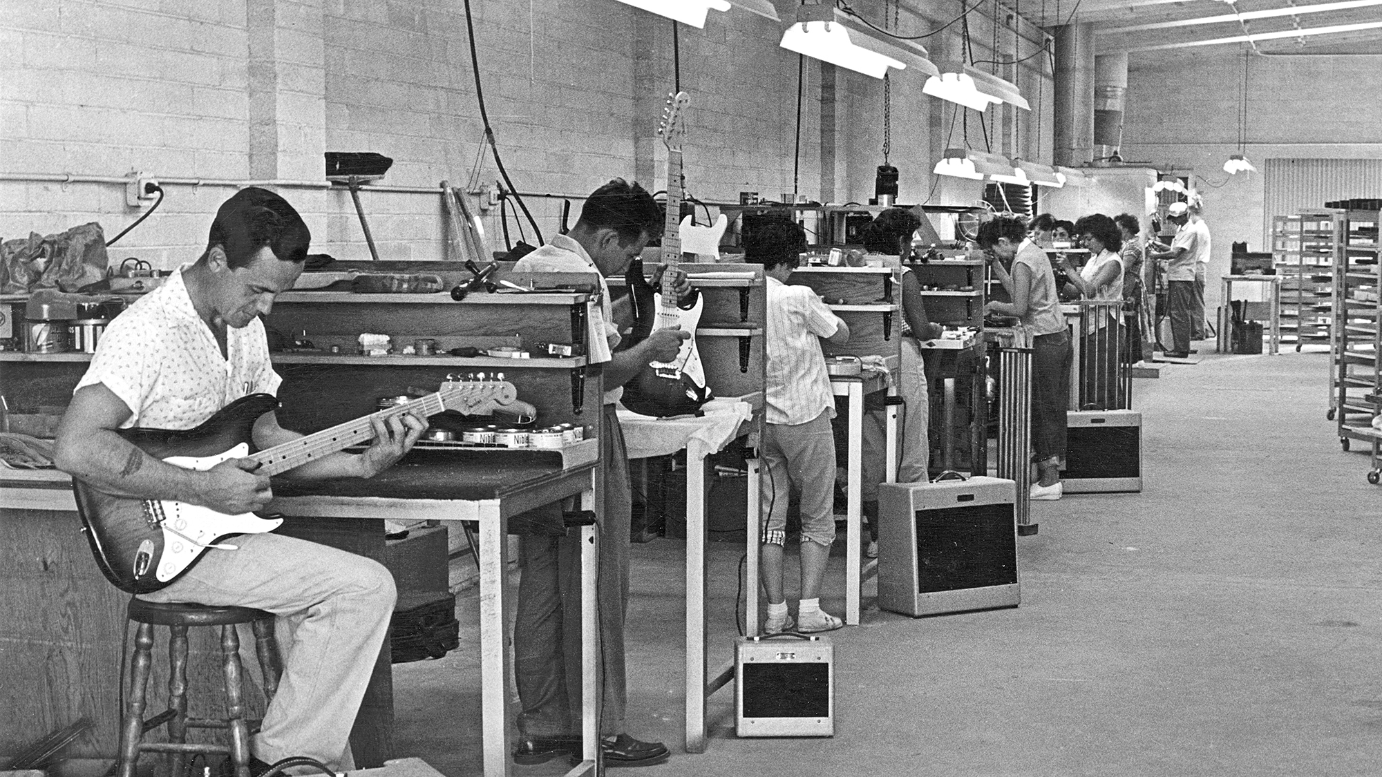 Fender employees create Stratocasters in the Fender factory in 1955