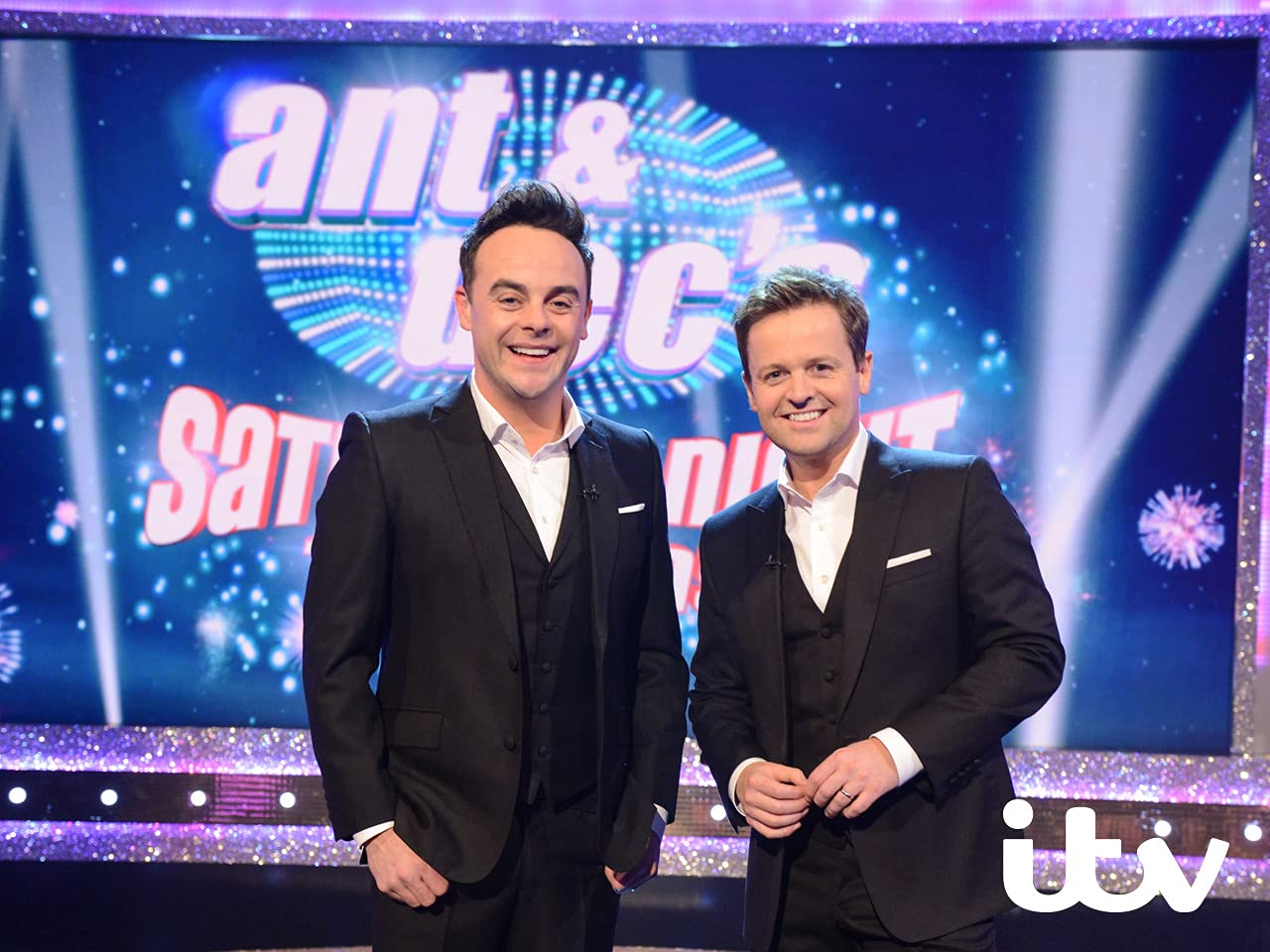Ant and Dec posing on the Saturday Night Takeaway set