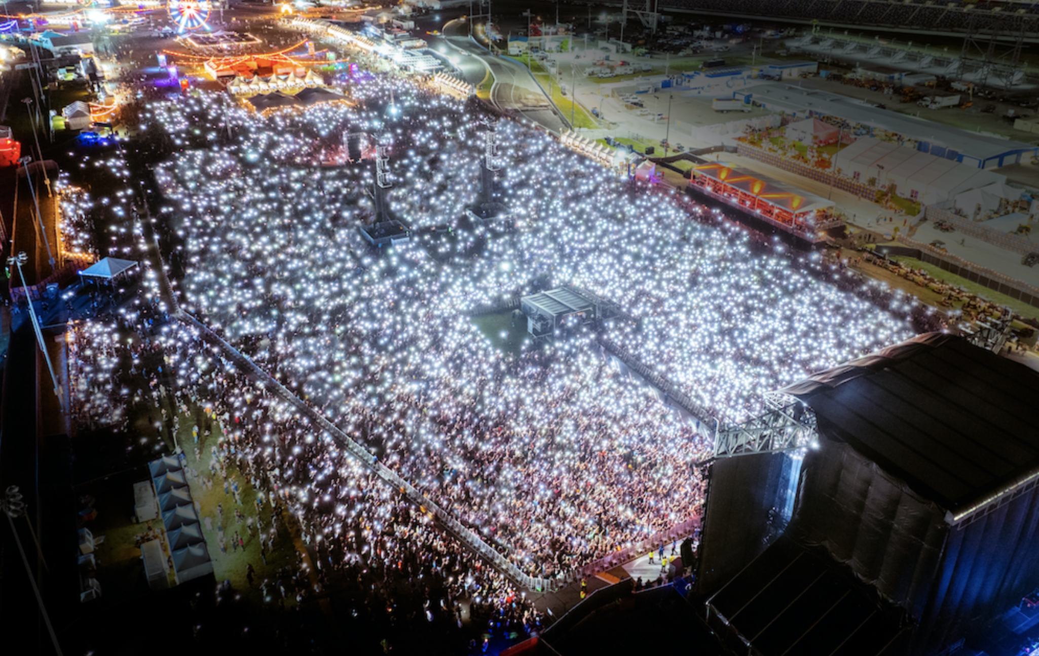 A huge festival crowd at night
