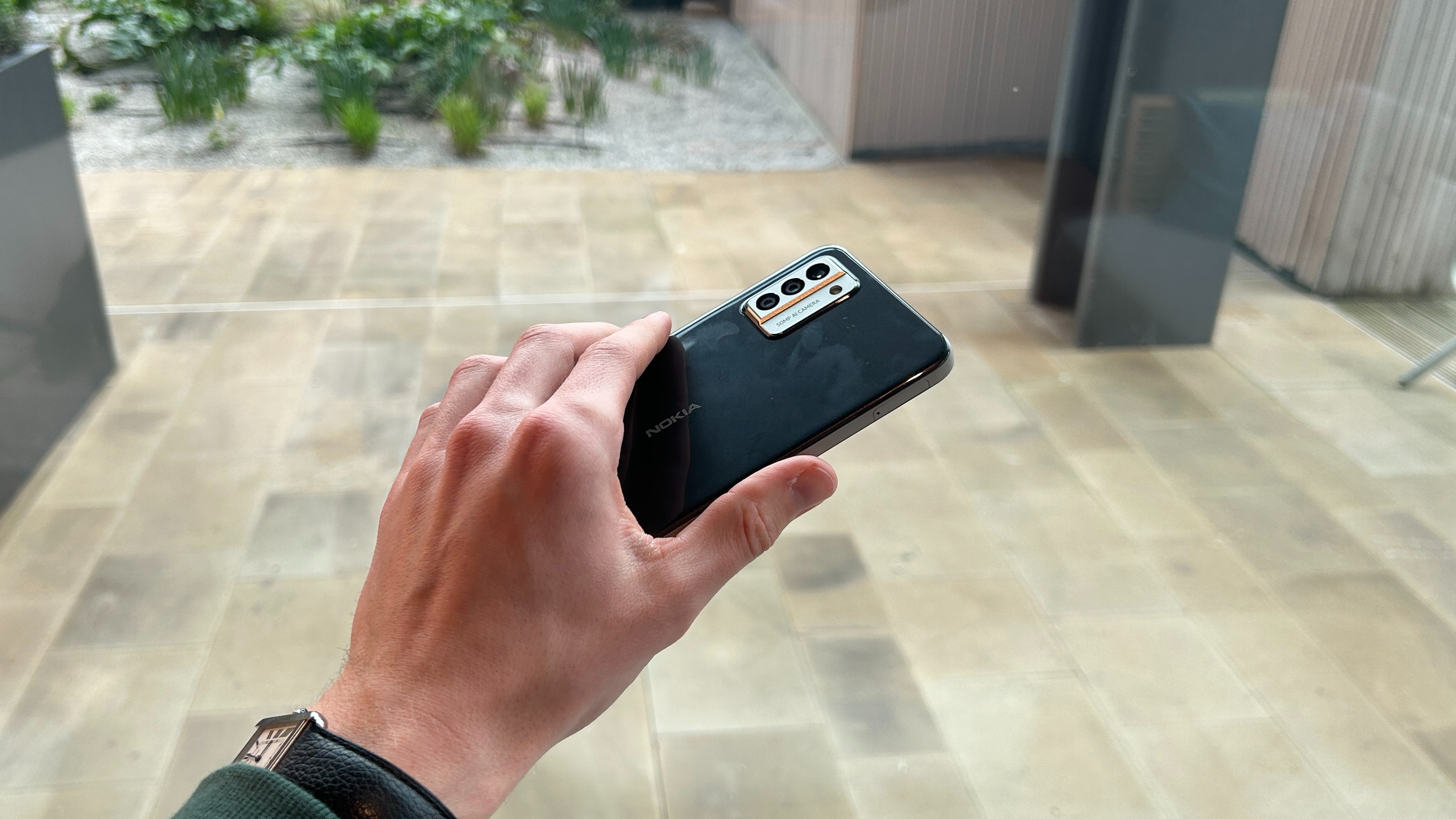 The Nokia G22 rear, as seen in hand