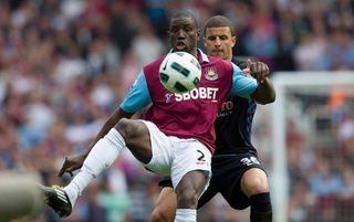 Demba Ba shields the ball from Aston Villa's Kyle Walker