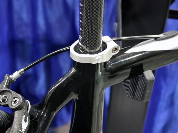 Seven does a neat job of fitting a round telescoping seatpost into a non-round seat tube.