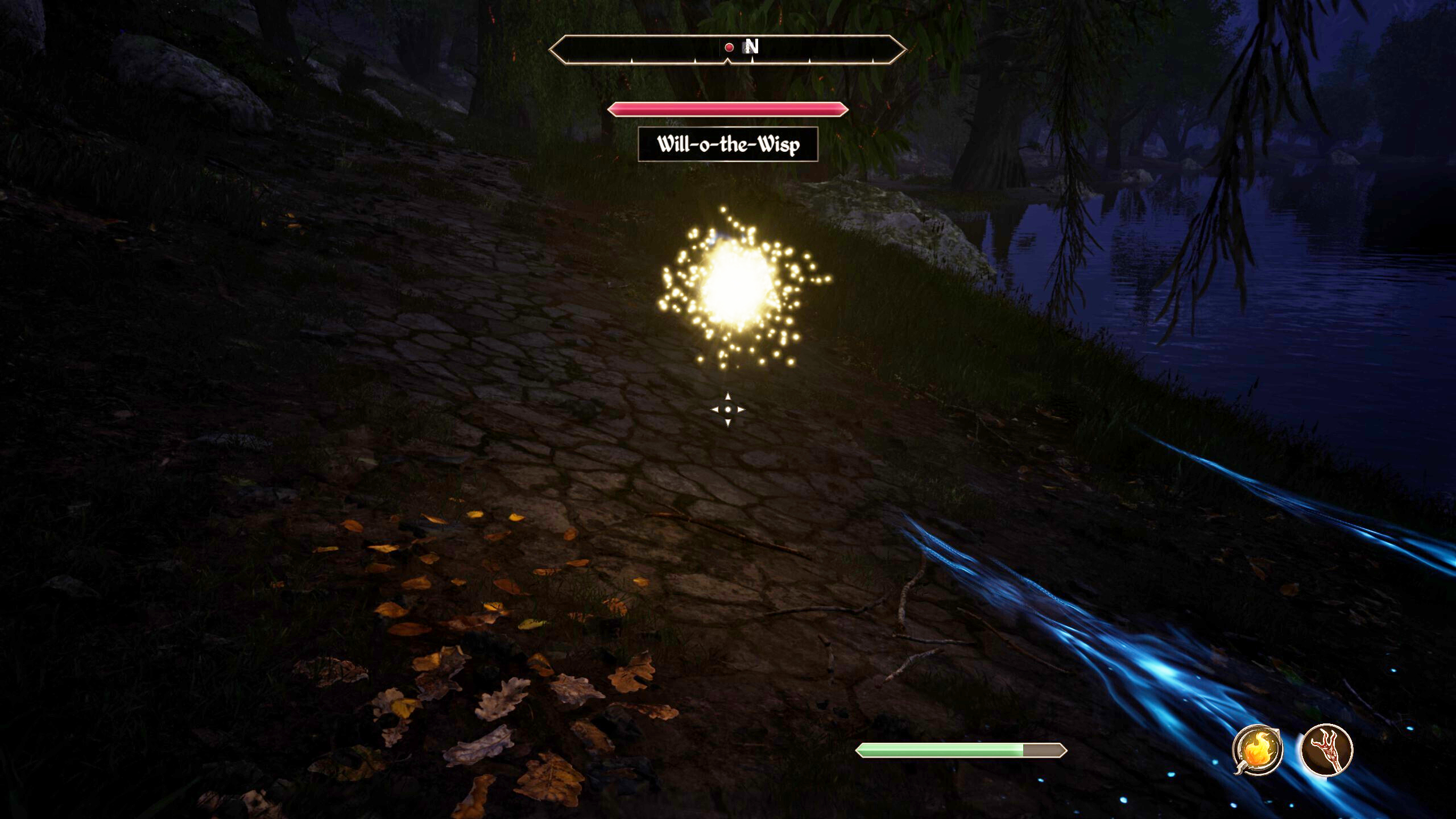  A player fighting a will-o-the-wisp by a river at night.